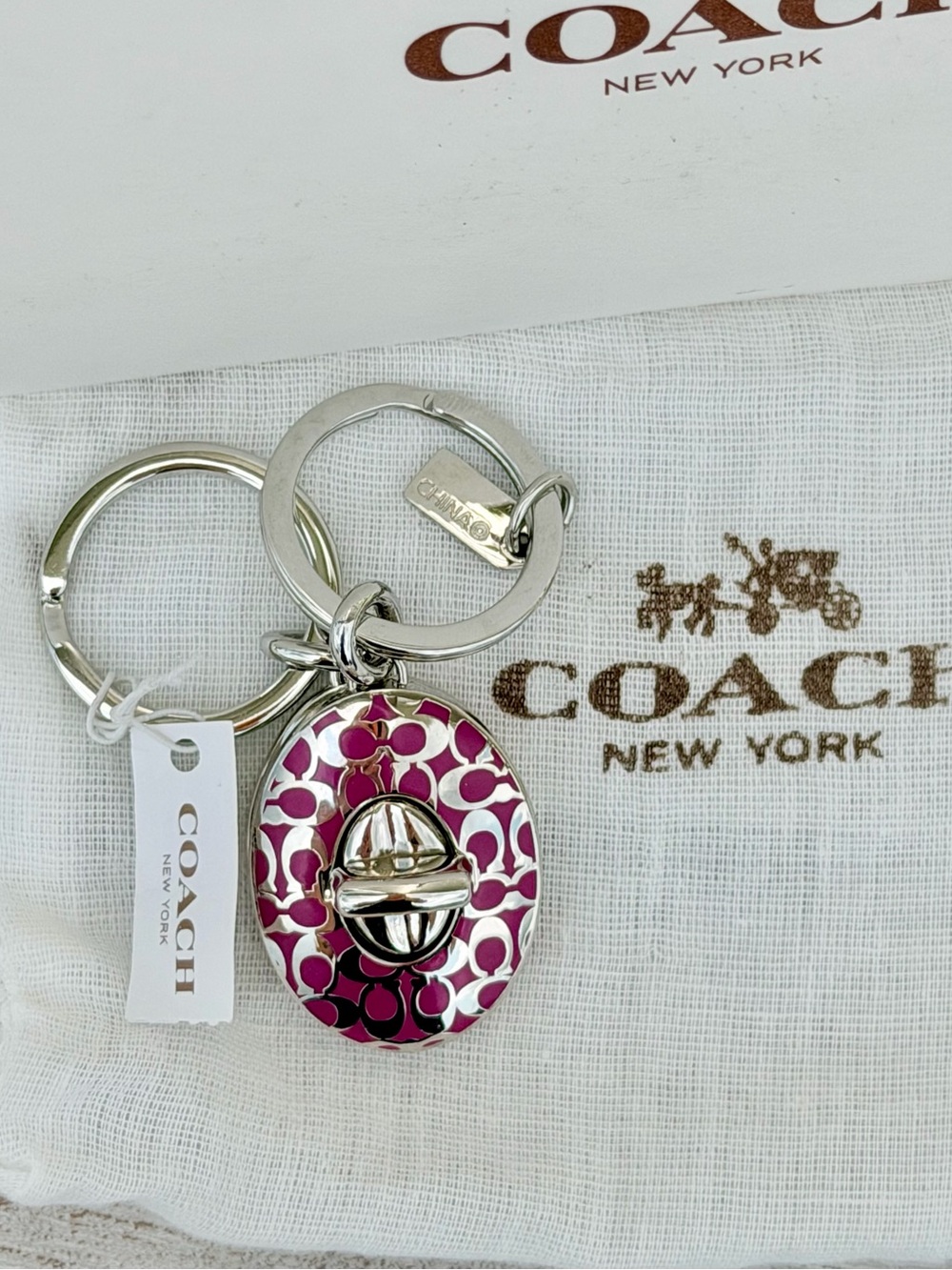 Coach Y2K Pink Signature Turnlock Keychain Charm NWT and box